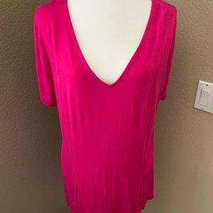 Lane Bryant short sleeve womens pink blouse with back tie detail.
